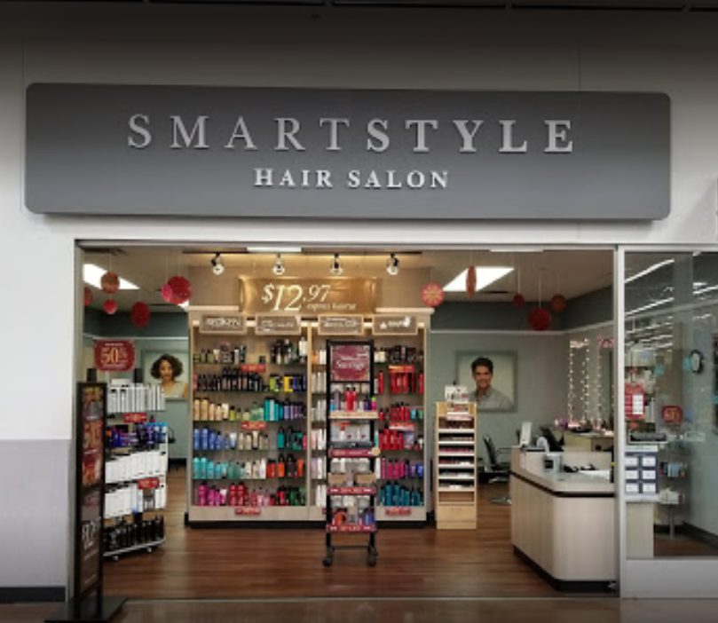 SmartStyle hair salon storefront with open entrance, product shelves, and styling stations inside