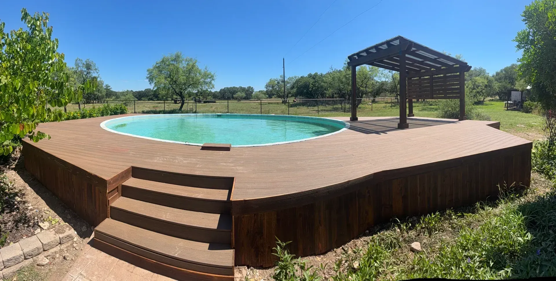 Backyard pool deck with pergola and steps, TTT Construction Burnet