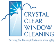 Logo for Crystal Clear Window Cleaning, showing a stylized blue window with sun rays and clouds, serving Fresno/Clovis.
