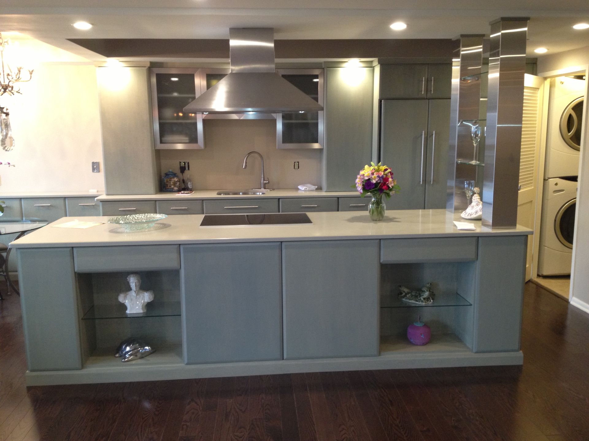 Kitchen with gray cabinetry and a central island