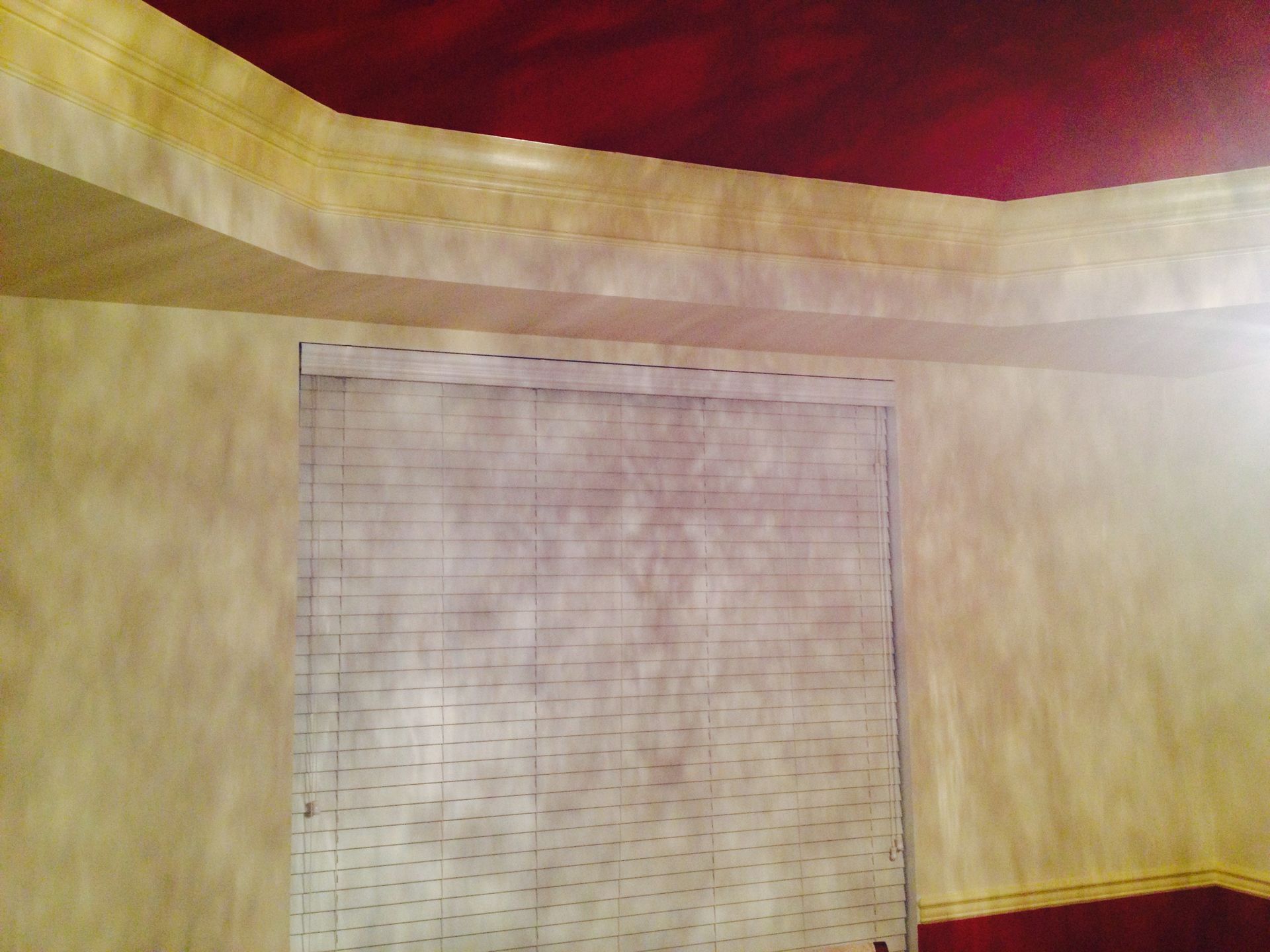Before: upper window trim beneath the dining-room crown moulding