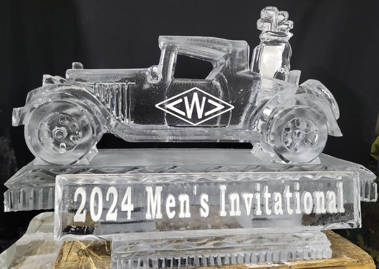 Crystal car trophy engraved “2024 Men’s Invitational” with a W logo