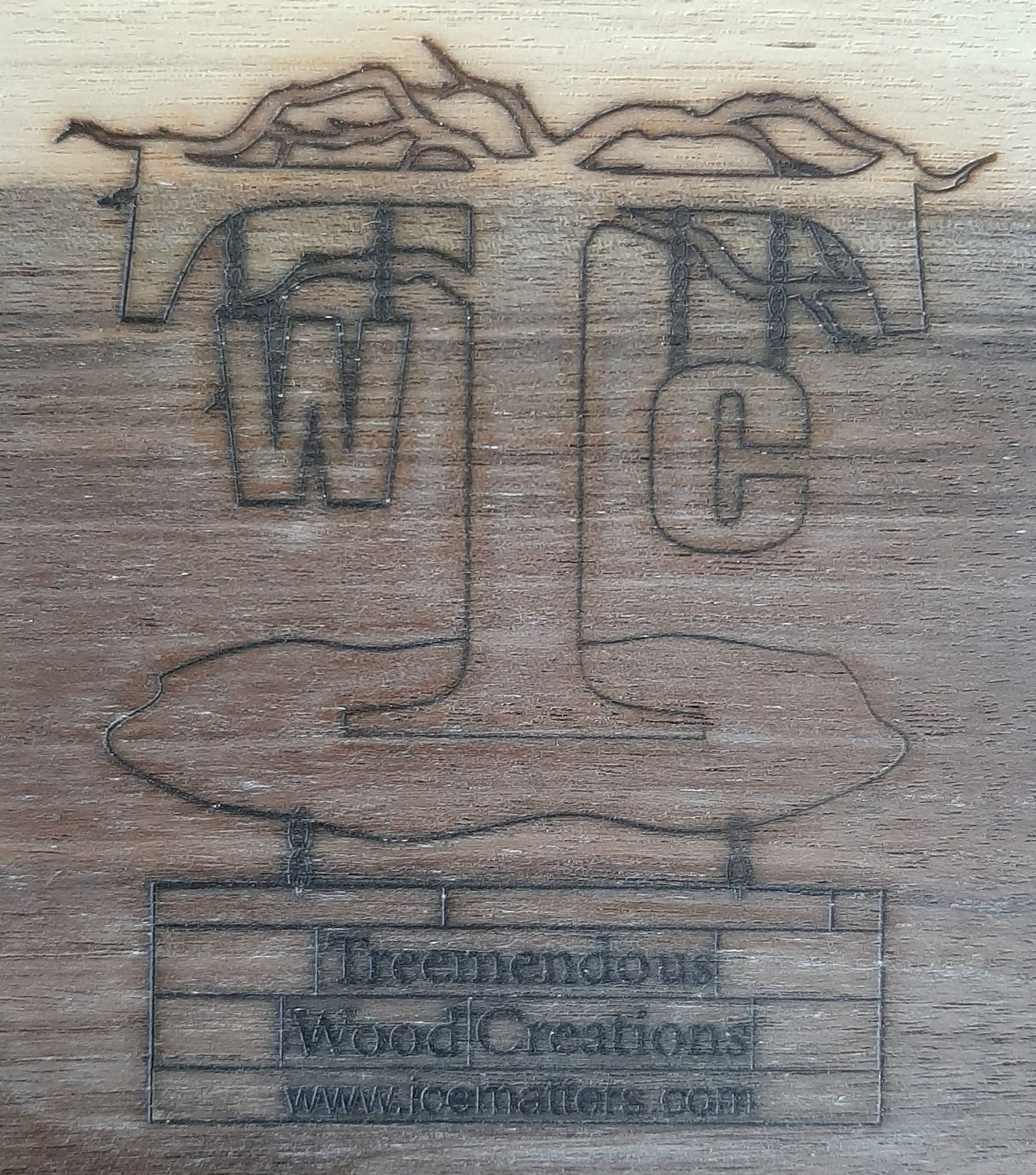 Faded sketch of a balance scale with the letters “T” and “C” hanging from each side.
