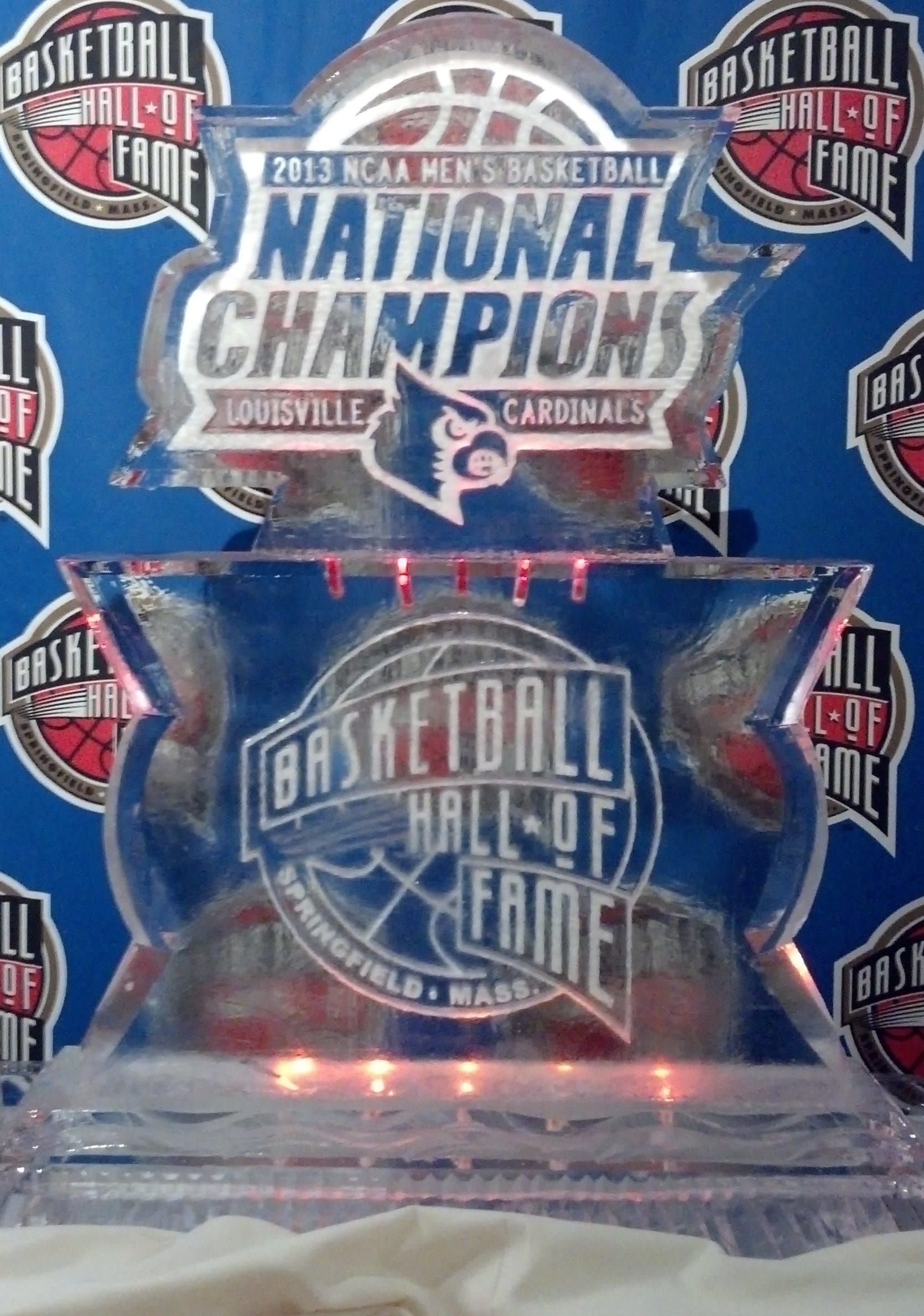 Basketball Hall of Fame National Champions plaque and pennant display in blue and silver