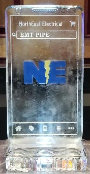 Clear trophy with blue “NE” logo and “northeast electrical EMT PIPE” text on top.