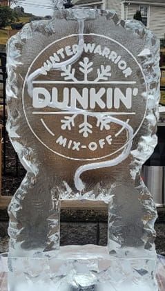 Dunkin’ “United Warriors” ice sculpture with “Mix-Off” text in an outdoor setting