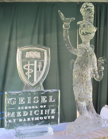 Geisel School of Medicine ice sculpture display with shield logo and a standing figure holding a cup