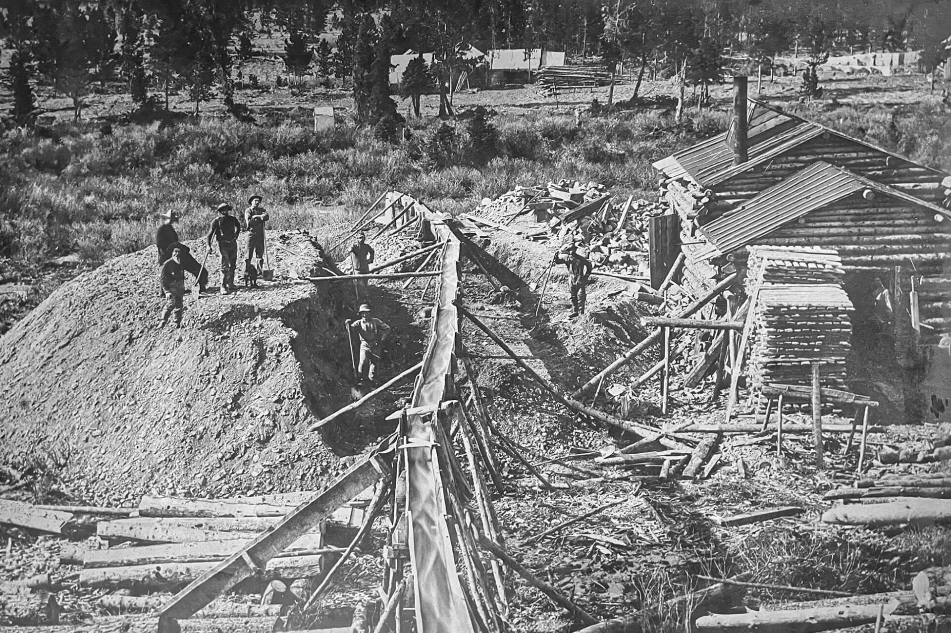 Workers moving and hauling materials in 1886.