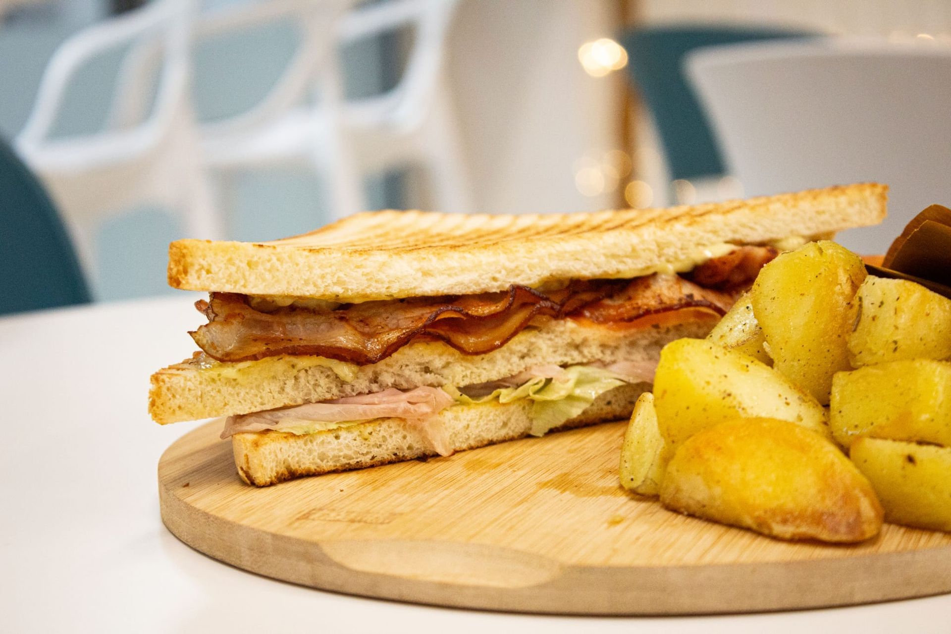 Tramezzino with a side of potatoes