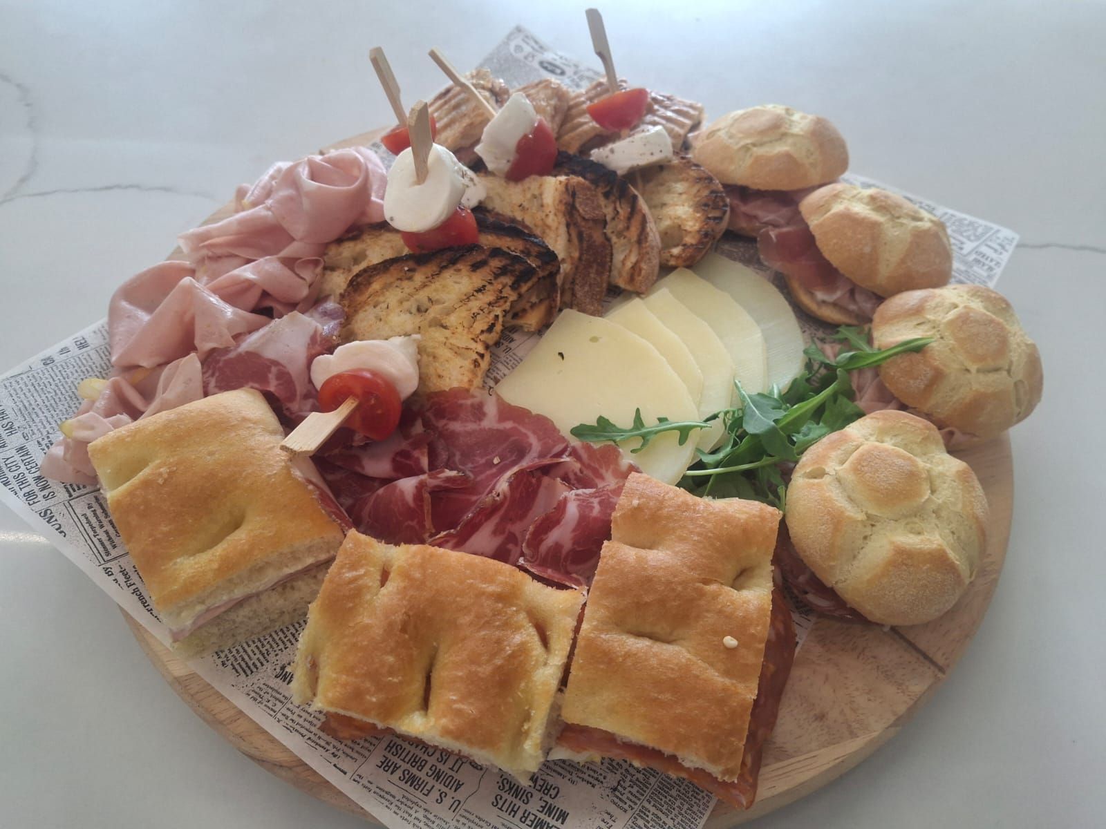 Chopping board cold meats, cheeses, taralli