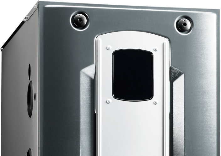 Close-up of a silver metal appliance panel with a central black opening and two screws at the top.