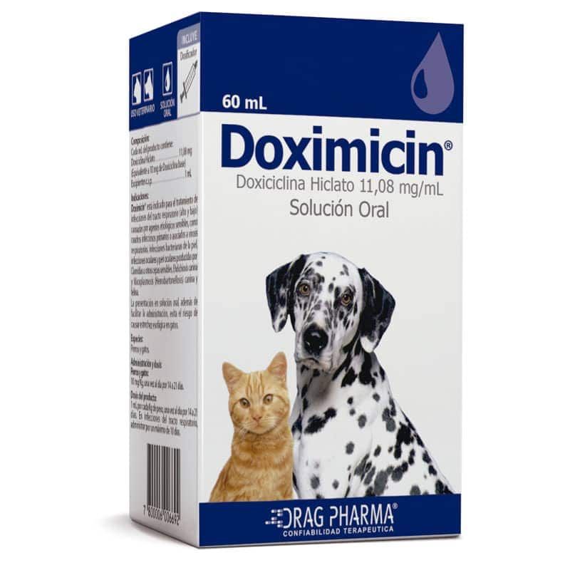 Caja de solución oral veterinaria de doximidina, 60 ml, con un perro y un gato en la parte frontal.