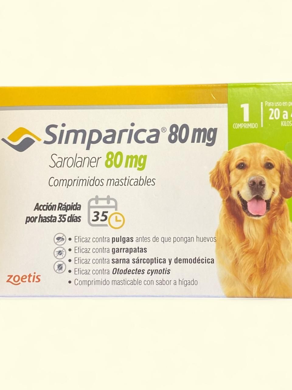 Caja de comprimidos para perros Simparica de 80 mg con un golden retriever en el envase, fondo amarillo y blanco.