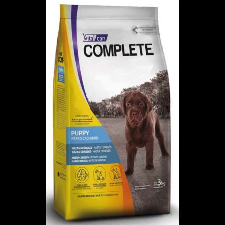 Bolsa de comida para cachorros Vita Can Complete con un cachorro marrón en la parte delantera, envase amarillo y azul.