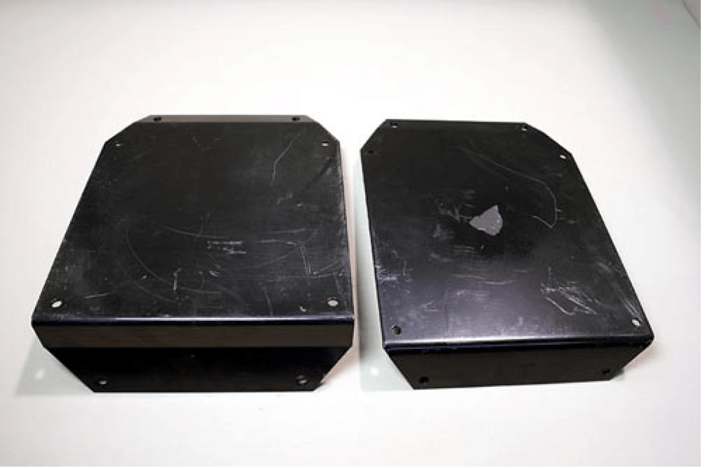 Two Black Boxes on a White Surface - Thomastown, VIC - KAB Performance Seating 