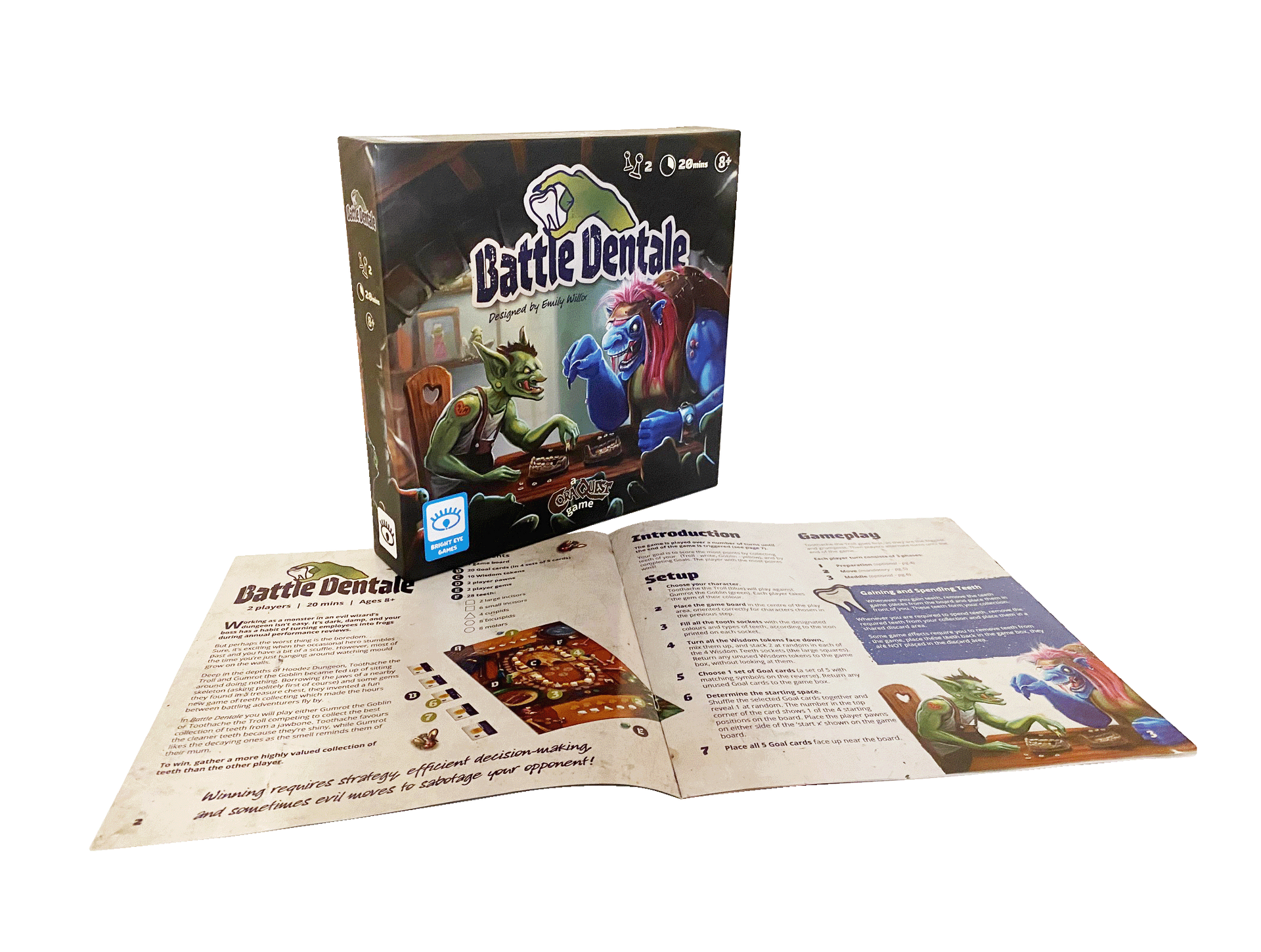 A box of a board game is sitting on top of a table next to a book.