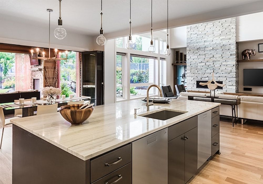 There Is A Large Island In The Middle Of The Kitchen — Paxi Homes Brad Clarke in Port Macquarie, NSW