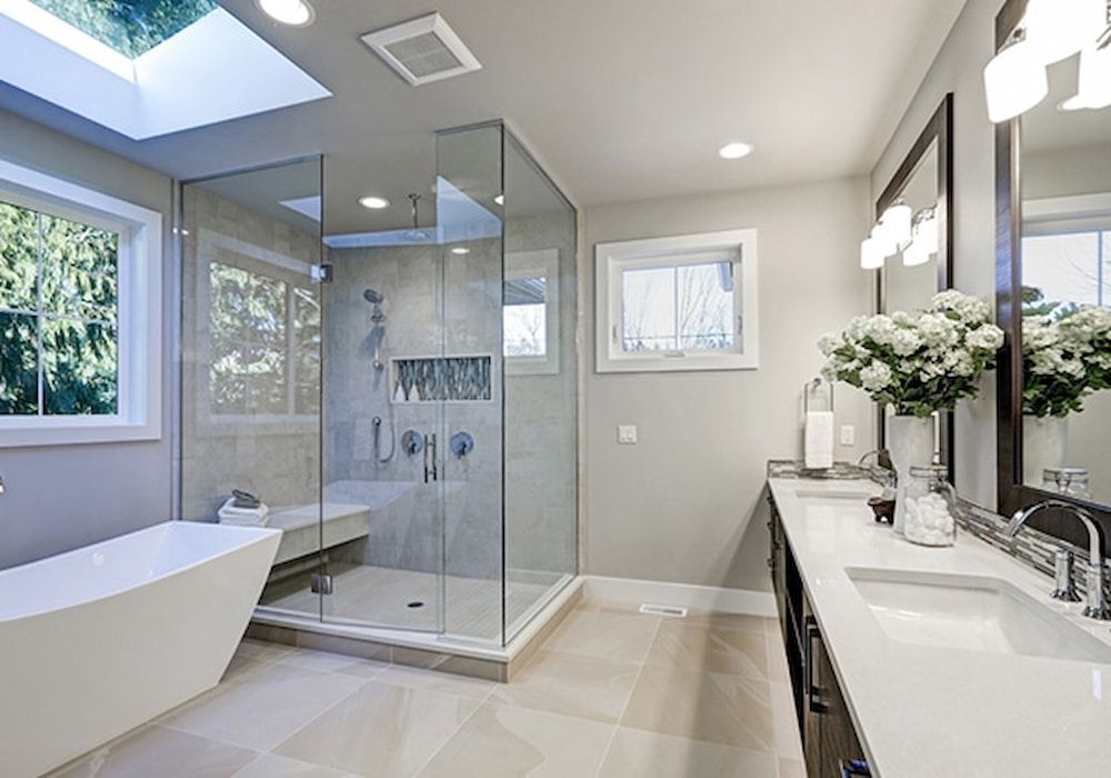 A Bathroom With Two Sinks, A Tub, And A Walk In Shower — Paxi Homes Brad Clarke in Port Macquarie, NSW
