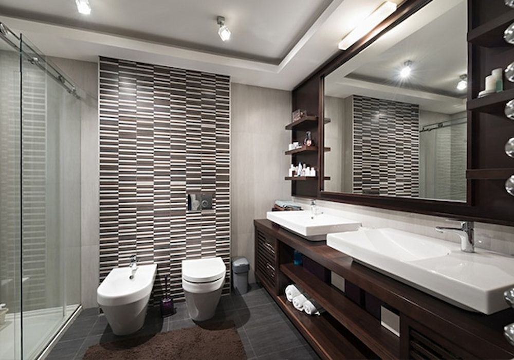 A Bathroom With Two Sinks, A Toilet And A Bidet — Paxi Homes Brad Clarke in Port Macquarie, NSW