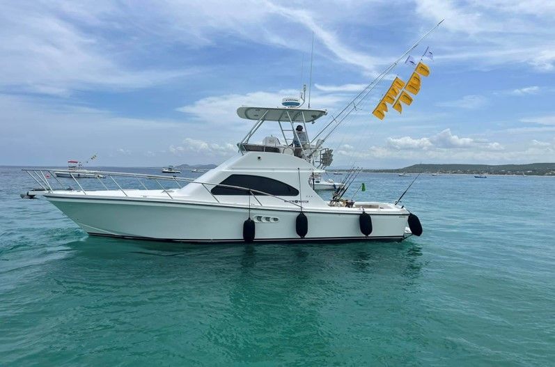 a large white boat is floating in the ocean