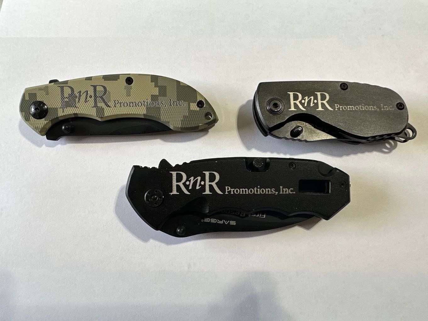 Three knives with the word rvr on them