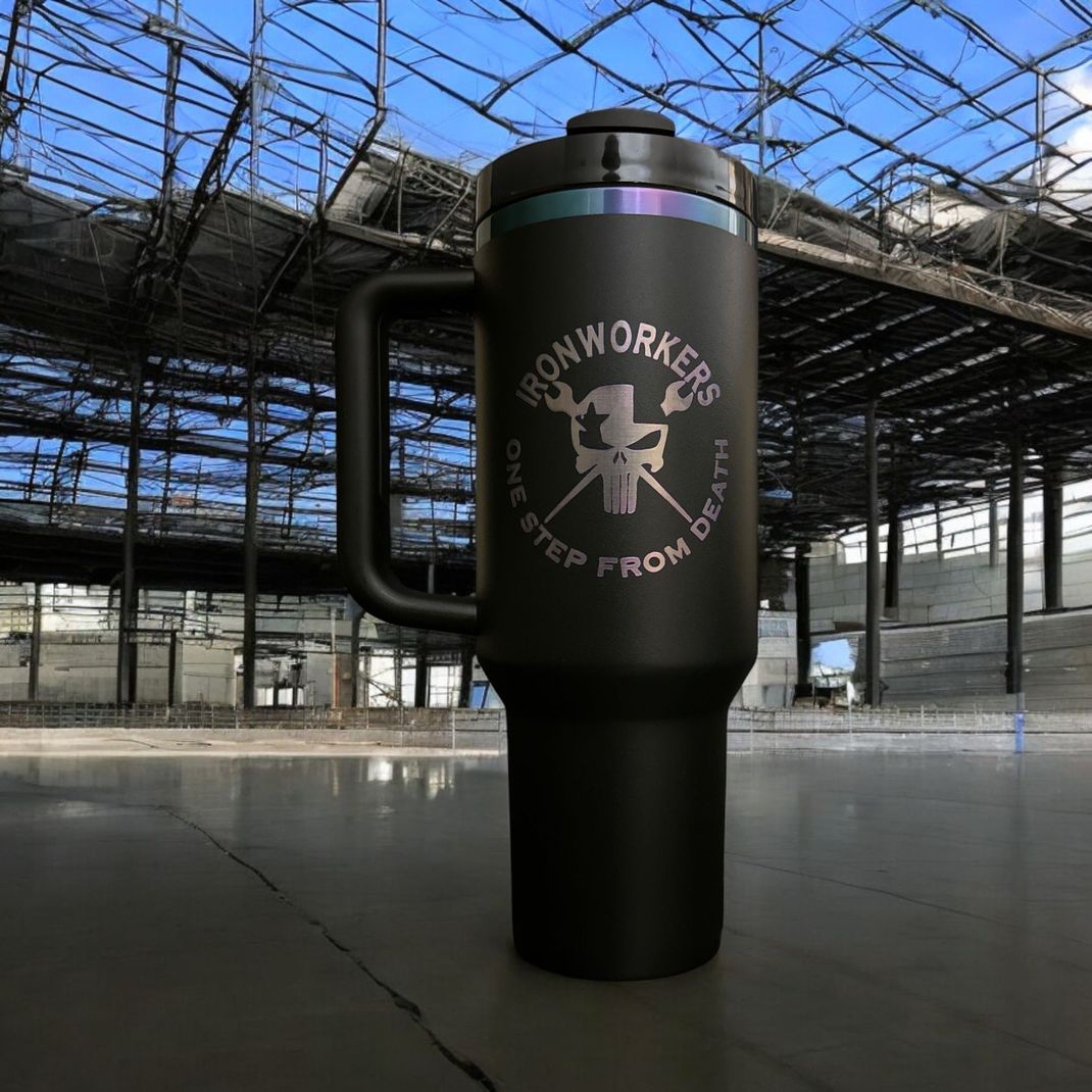 A black mug with the words iron workers on it