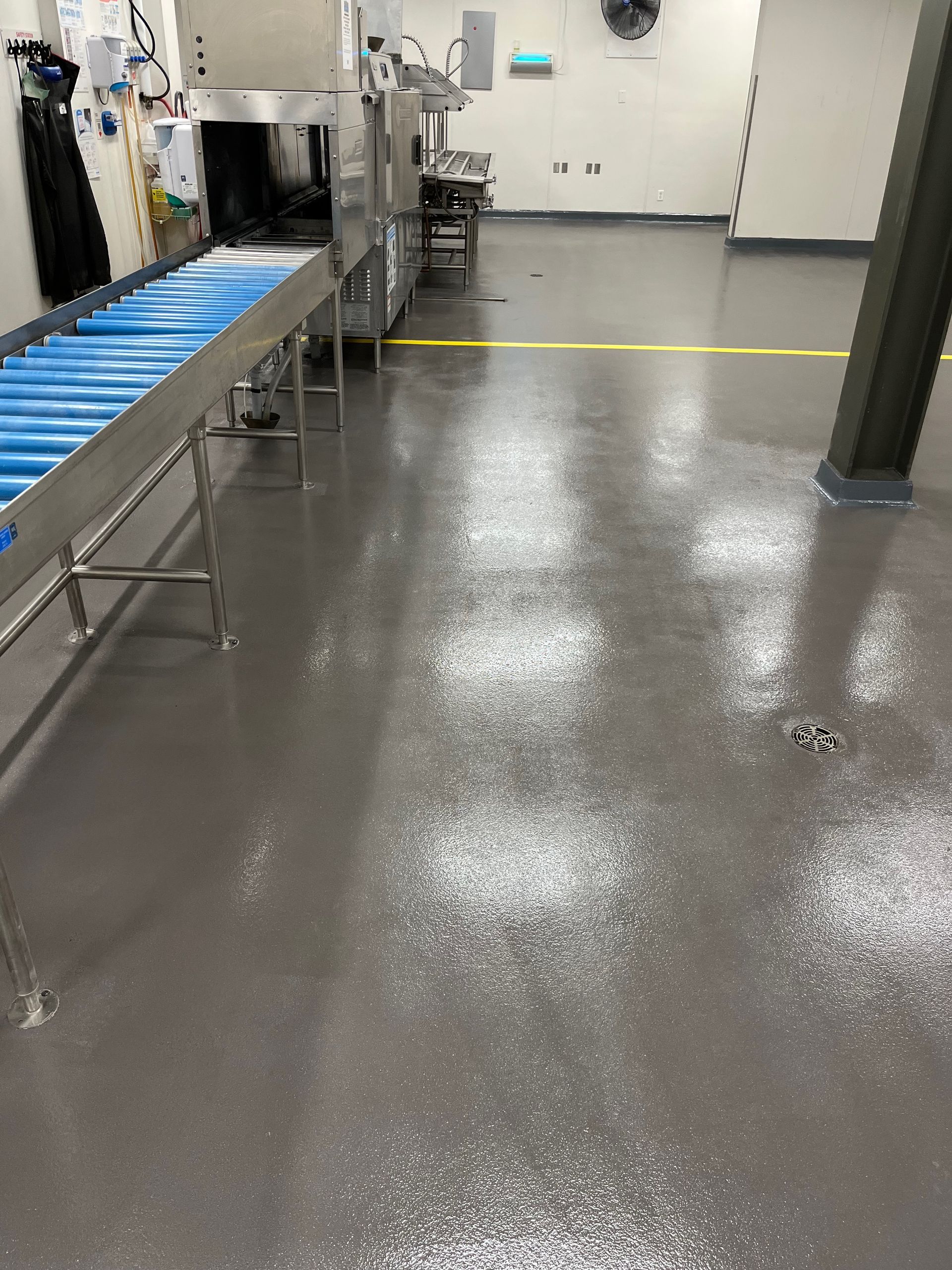 There is a conveyor belt in the middle of the room.