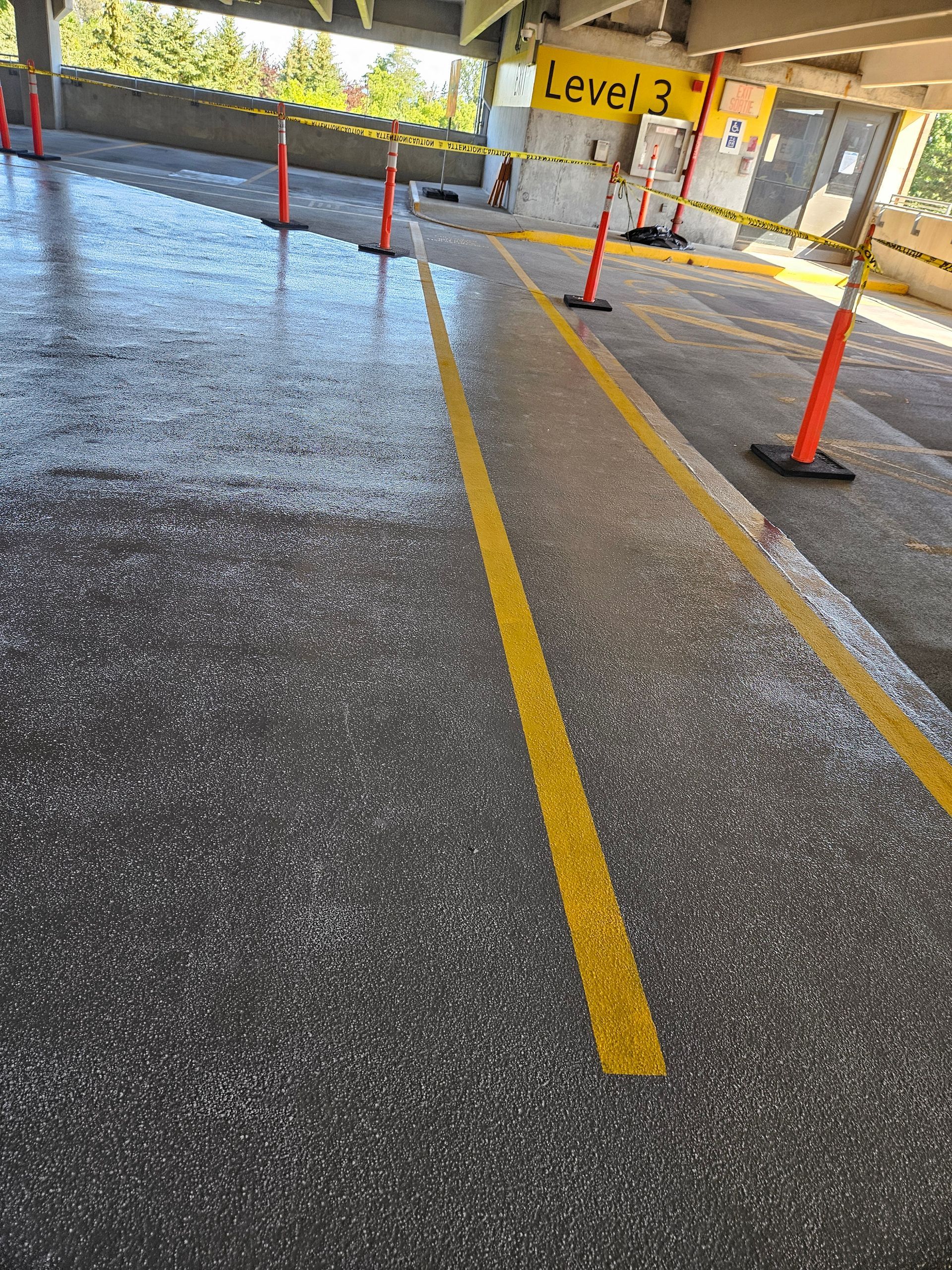 A parking lot with a sign that says level 3 on it.