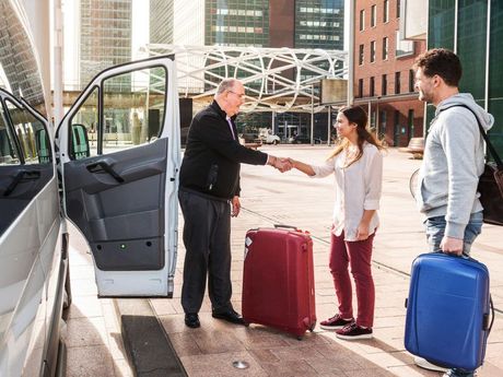 Lady being Assisted by Chauffeur — Westville, NJ — Zark Limo Lady being Assisted by Chauffeur — Westville, NJ — Zark Limo