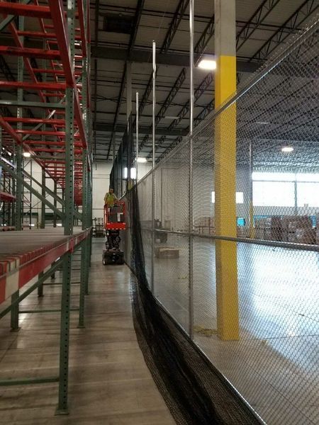 Warehouse interior with safety netting 
