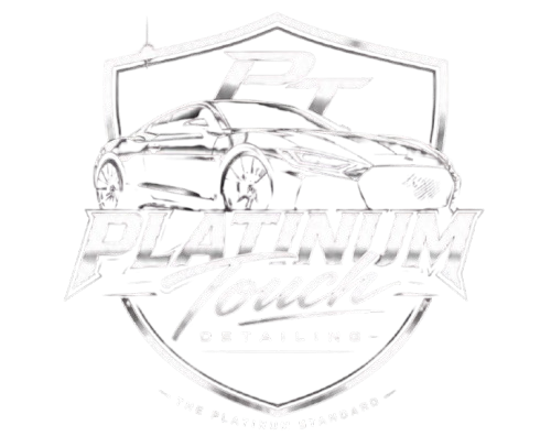 White logo of a sports car over a shield with the word &ldquo;PLATINUM&rdquo; and cursive text below
