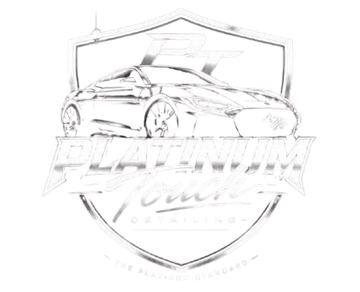 White logo of a sports car over a shield with the word “PLATINUM” and cursive text below