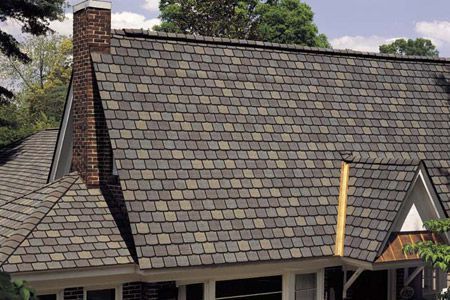Roofer Removing Old Shingles — Akron, OH — D&M Roofing LLC