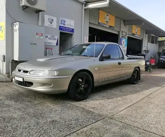 Silver Holden Utility Parked Outside a Garage — D R Automotive in Russell Vale, NSW