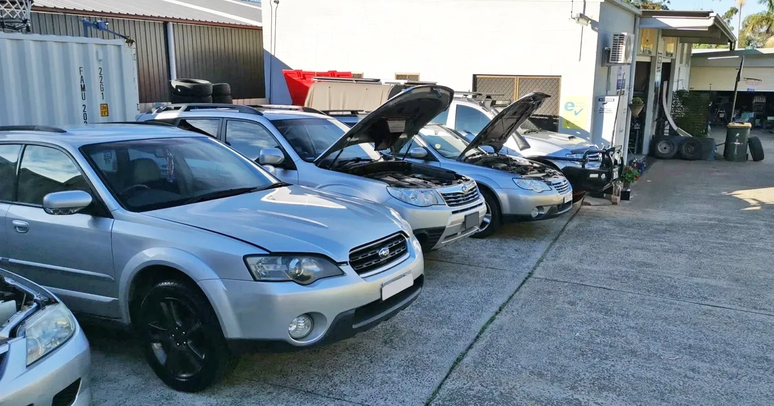 A Fleet of Silver Sedans Being Inspected For Safety Certificates — D R Automotive in Russell Vale, NSW