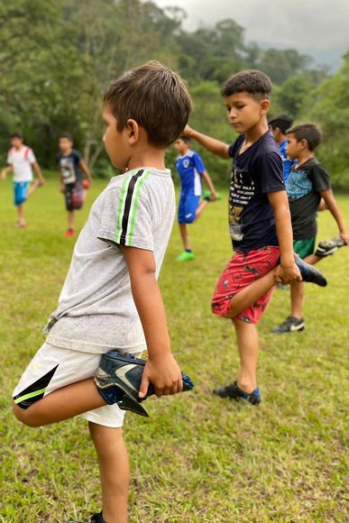 young Honduran boys playing soccer