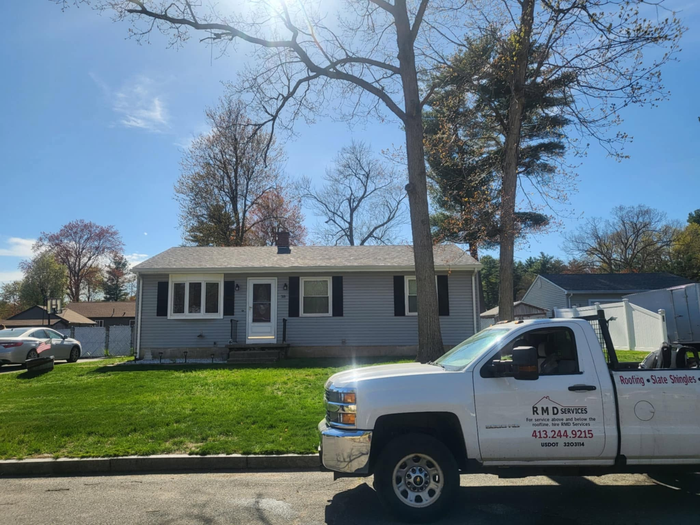 A Blue And White Truck With The Word Services On The Side — Brimfield, MA — RMD Services, Inc. A Blue And White Truck With The Word Services On The Side — Brimfield, MA — RMD Services, Inc.