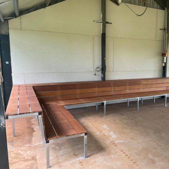 Long Wood Chair — Mobcon Construction in Berry Springs, NT