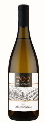 A bottle of chardonnay wine with a white label on a white background.