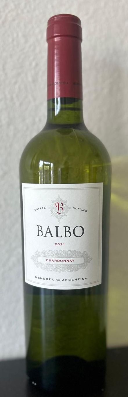 A bottle of balbo wine with a red cap
