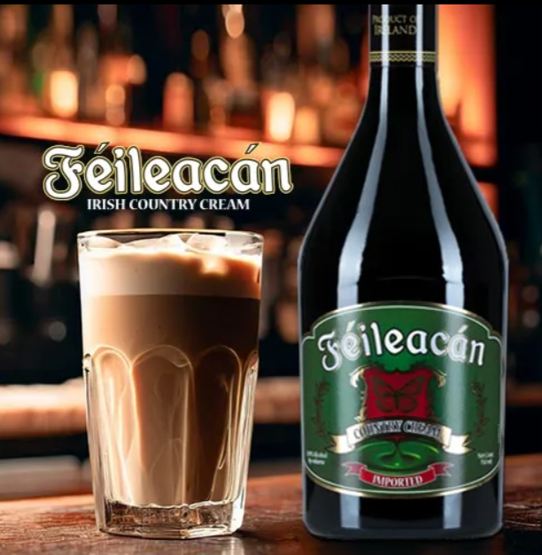 A bottle of seileacan next to a glass of coffee