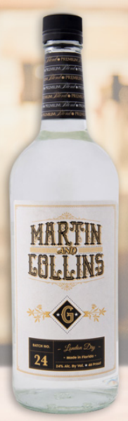 A bottle of martin collins sits on a table