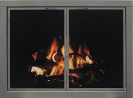 Fire burning behind a closed screen door inside a fireplace. Flames are orange and yellow.