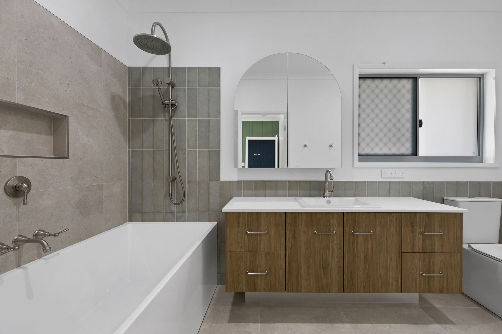 Bathroom With Two Sinks And A Large Mirror — City Cabinetmakers in Mackay, QLD