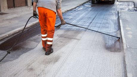 Man Doing Sealcoating — Calabasas, CA — S & S Paving