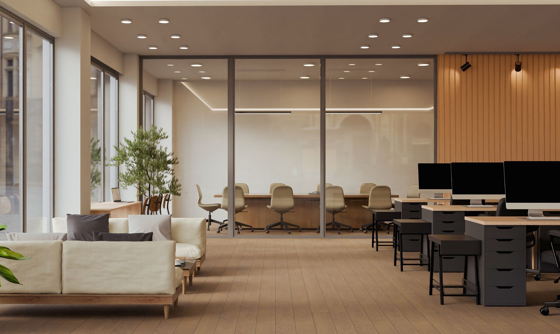 Modern open office lounge with sofas, conference room, desks, and warm wood accents