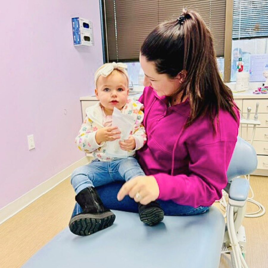 Young child with her mom at dental clinic near Yonkers NY