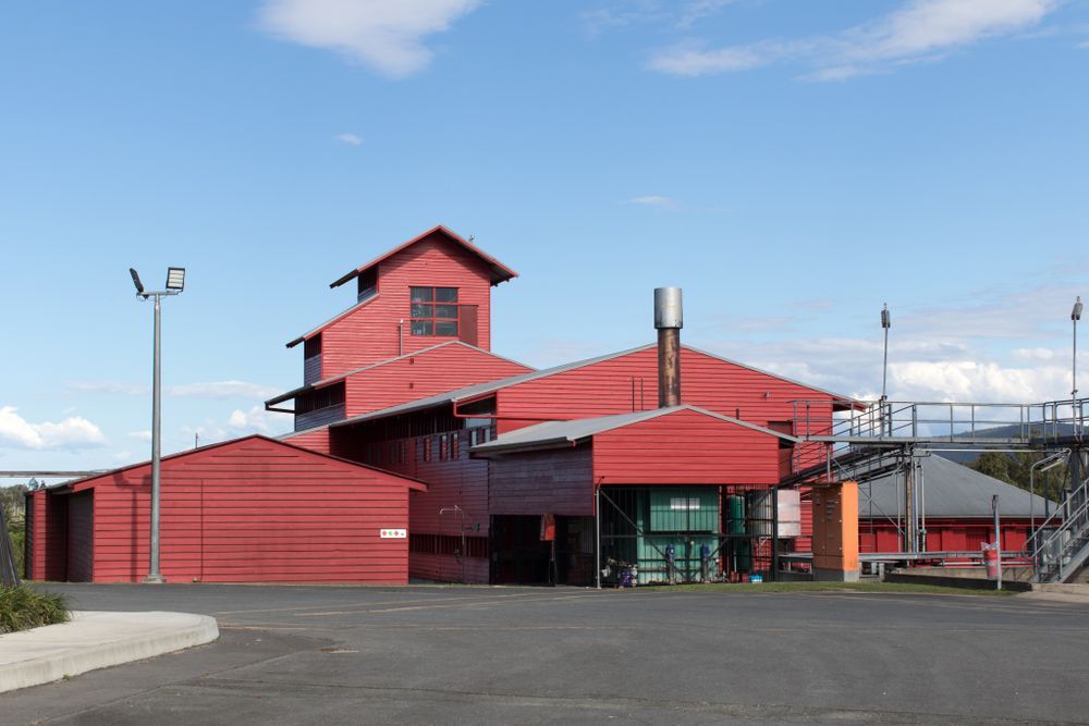 Red Building With a Tower and Glass Entrance on a Paved Lot — Accredited Training in Beenleigh, QLD