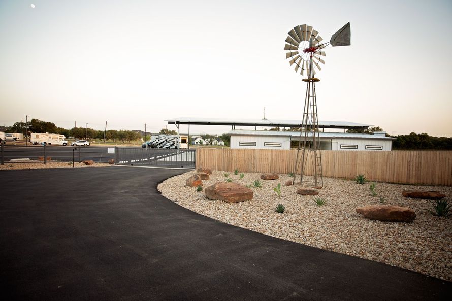 Aerial view of paved RV sites at Riata RV Community in Weatherford TX
