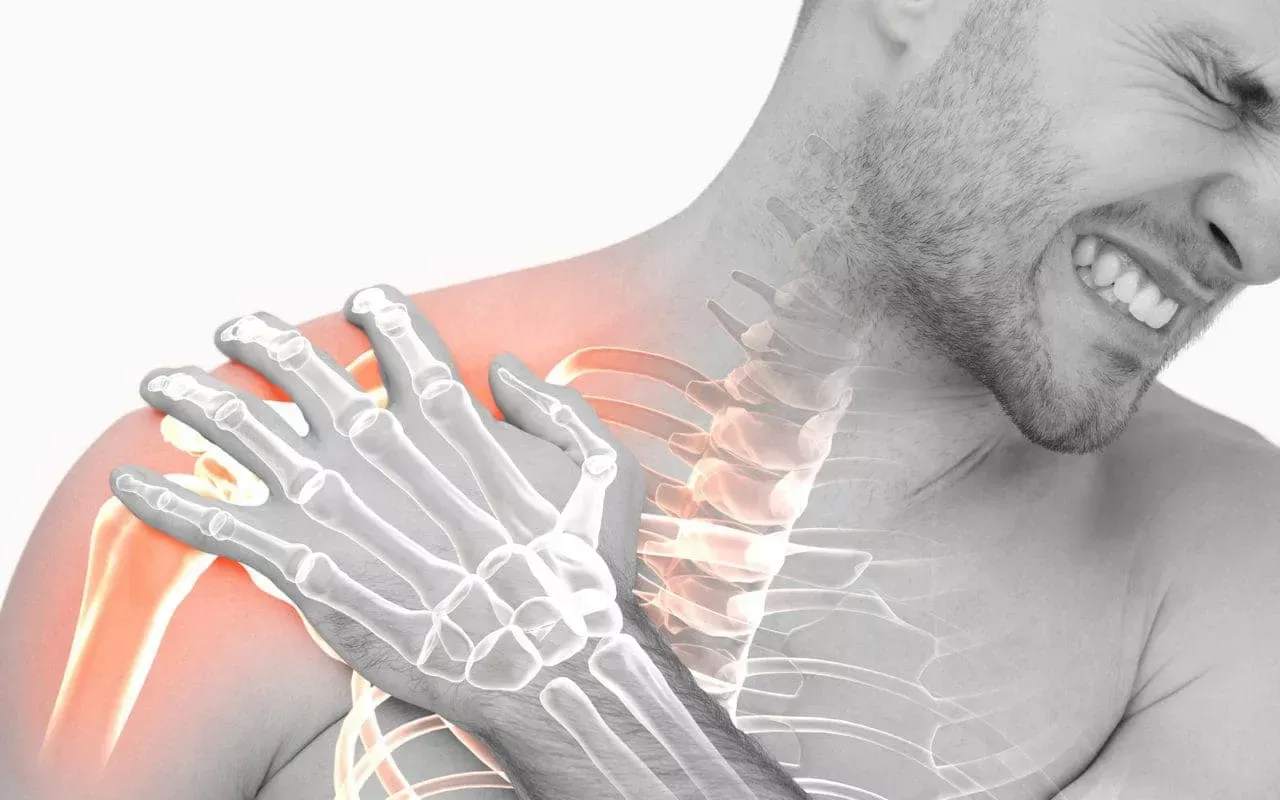Shoulder pain illustration with highlighted upper arm and neck joints, man grimacing in discomfort